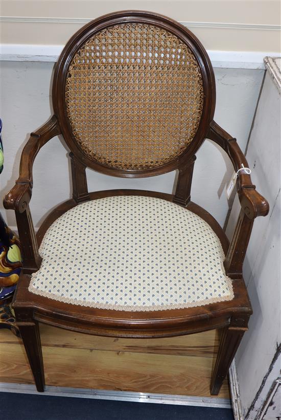 A giltwood open armchair and another armchair